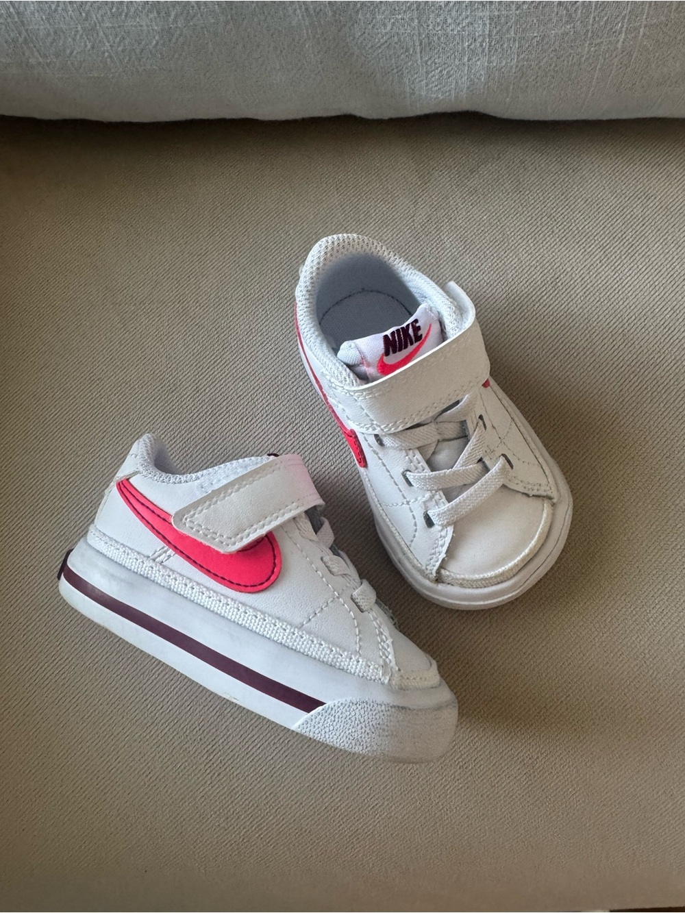 Nike Kids White Sneakers with Pink Swoosh